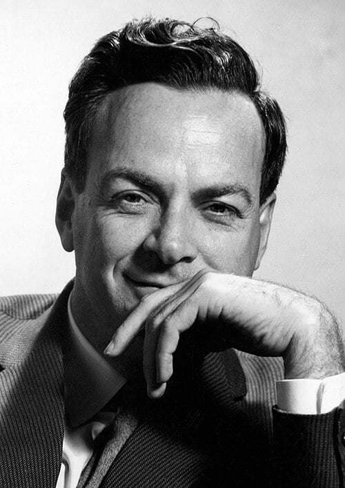 A black and white photo of Richard Feynman
