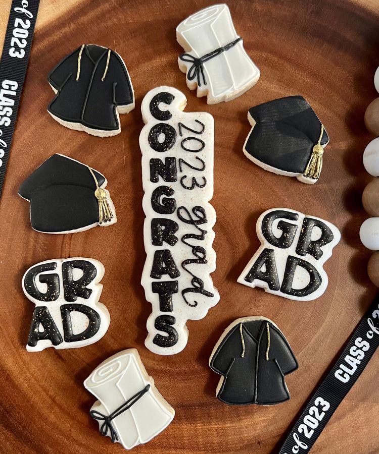 Black and White Graduation Cookies on a wooden tray