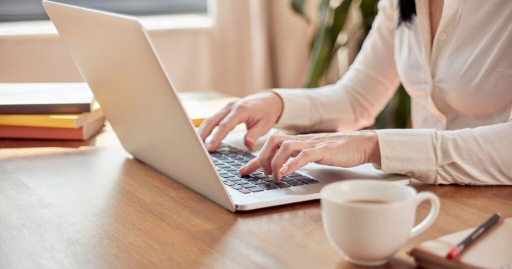 A woman working on her laptop