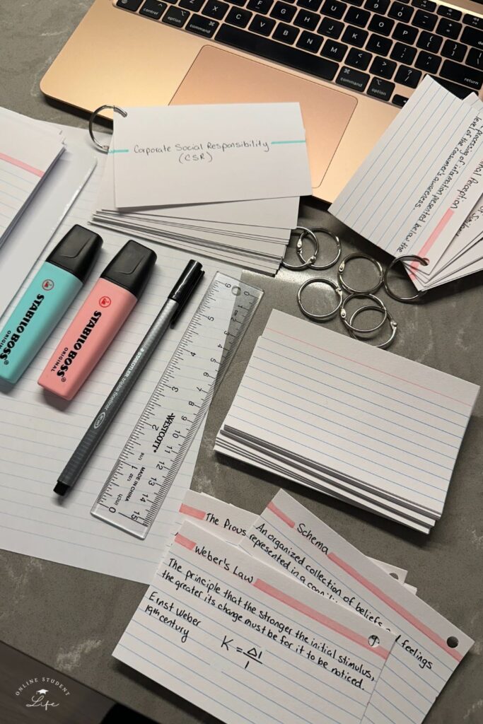 Flashcard materials on a desk.